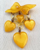 BP154 pearlized goldenrod bakelite heart bow & hearts  charm pin